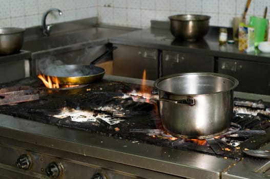 old and shabby dirty commercial kitchen interior