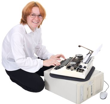 The girl printing on an ancient typewriter