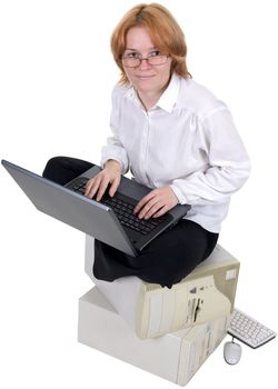 The girl working on the laptop on a white background