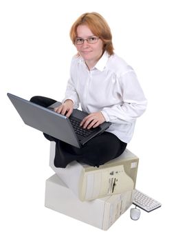 The girl working on the laptop on a white background