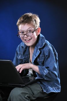 The boy of ten years acts part mad young hacker