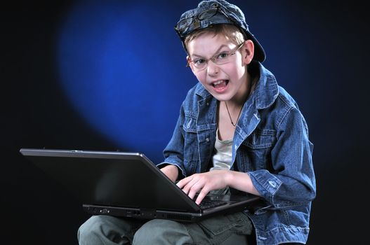 The boy of ten years acts part mad hacker