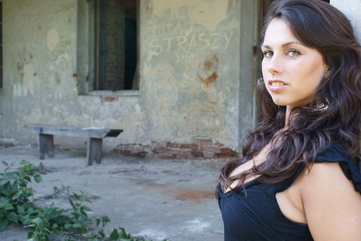 Young girl in old house