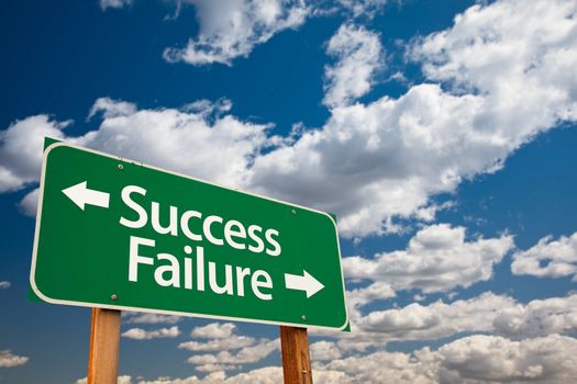 Success, Failure Green Road Sign with Copy Room Over The Dramatic Clouds and Sky.