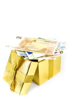 Euro money in golden gift box isolated on white.