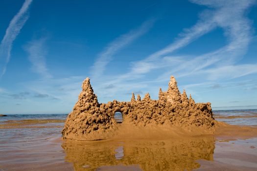 Towers of sand castle at the seaside