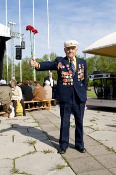 Old soviet veteran with many medals at Celebration of May 9 Victory Day (Eastern Europe) in Riga at Victory Memorial to Soviet Army. Riga, Latvia, May 9, 2008