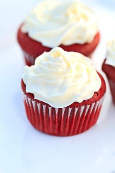 Red Velvet Cupcake with buttercream icing. Shallow DOF.