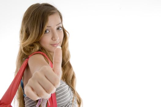 student showing thumbs up hand gesture on  an isolated white background 