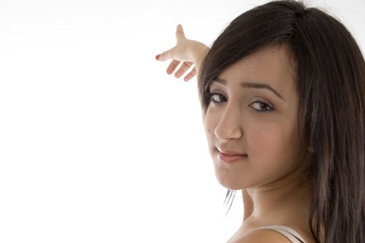 female pointing on  an isolated white background 