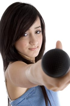 front view of girl showing microphone on  an isolated white background 