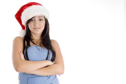 girl with christmas hat looking at camera on  an isolated white background 