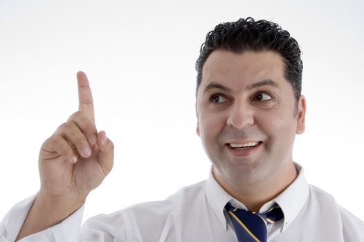 portrait of businessman indicating upward on  an isolated white background 