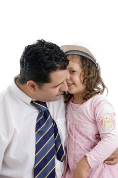 smiling daughter whispering in his father's ear