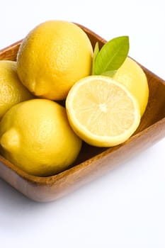 A bowl of bright yellow lemons.