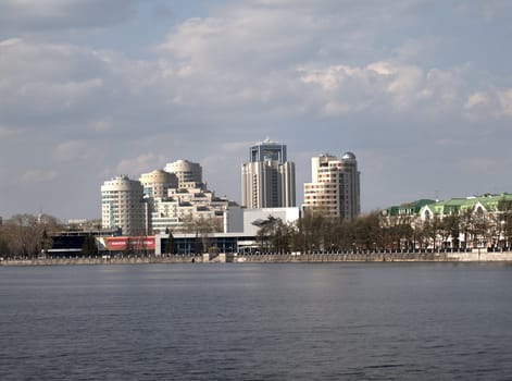 The city of Ekaterinburg. The river an Iset. A kind on cinema concert theatre ' Kosmos ' and new buildings.