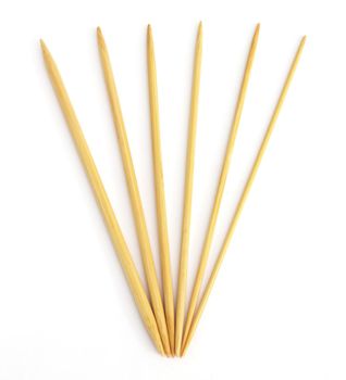 Variety of bamboo knitting needles in different sizes
