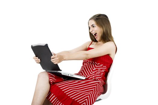 Angry woman with a laptop - isolated on white