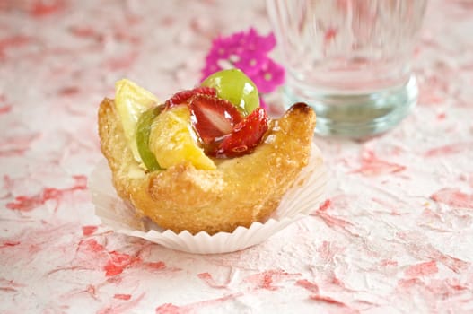 Delicious small tart filled with fruit