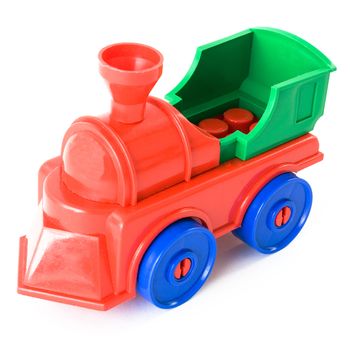 Nursery multi-coloured toy steam-engine on a white background