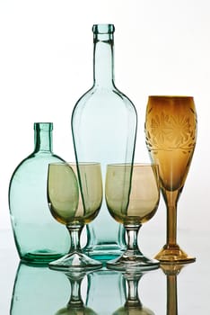 old bottle and drinking glass isolated