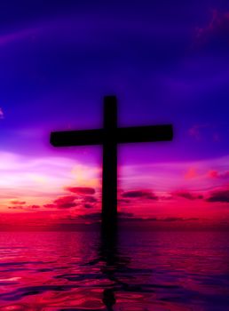 The cross of Jesus in a tranquil ocean seascape.

