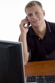 happy man talking on mobile on an isolated white background