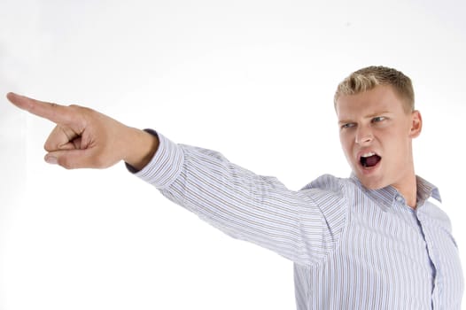 caucasian man pointing on an isolated background