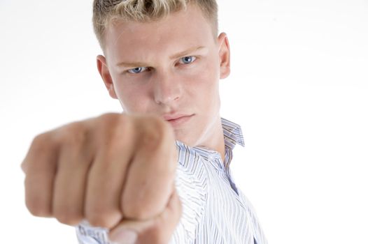 male showing his fist on an isolated white background