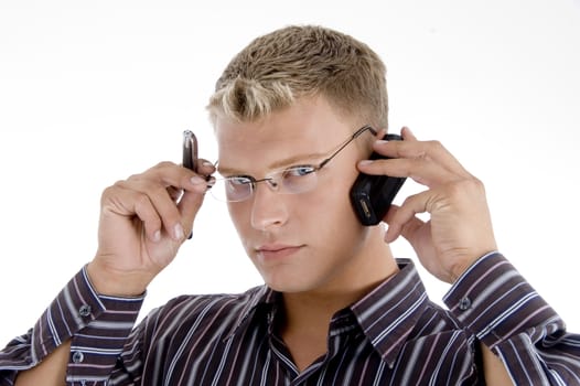 serious businessman communicating on cell phone isolated with white background