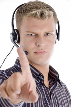 male with headset showing his index finger against white background