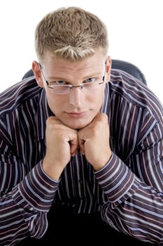 smart businessman with his chin resting on his fists isolated on white background