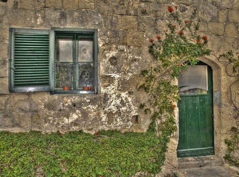 Strange figure in window at servants quarters at Verdala Castle in Malta