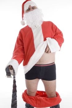 santa clause holding his coat and belt on an isolated white background