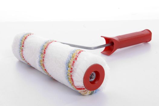 paint roller against white background