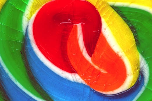 A close-up of a colorful lollipop candy