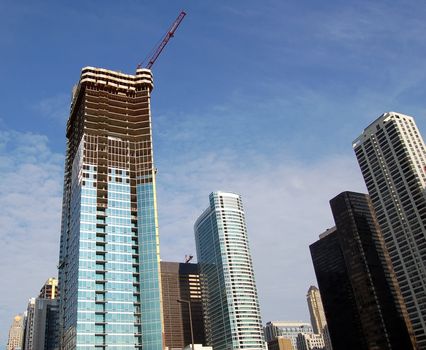 Picture of a skyscraper being built in downtown Chicago