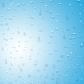 Image of various rain drops on a blueish background.