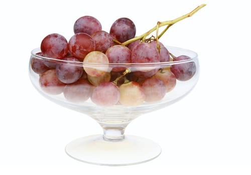 red grapes in glass isolated with clipping path.