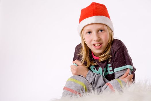 Happy blond girl and her christmas thoughts