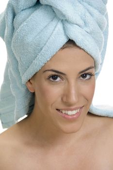 portrait of a woman with a towel on her head  on an isolated white background
