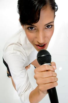 ariel view of female singer performing on an isolated white background