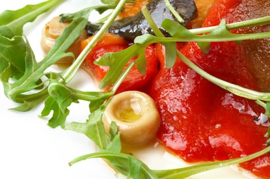 appetizer with fresh rocket salad, stewed red sweet pepper and mushtooms