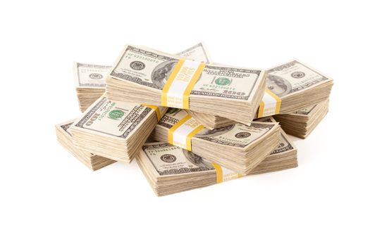 Stacks of Ten Thousand Dollar Piles of One Hundred Dollar Bills Isolated on a White Background.