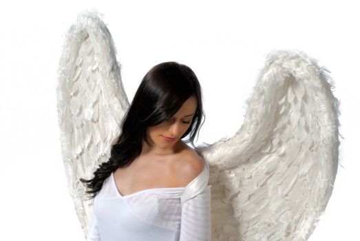 Young woman with angel wings isolated on white