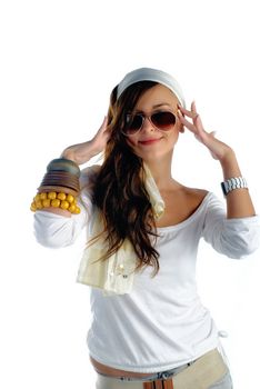 Beautiful young woman fixing her sunglasses isolated on white