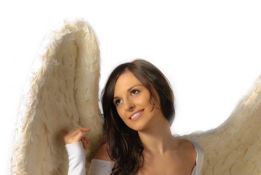 Angel woman looking up and smiling isolated on white
