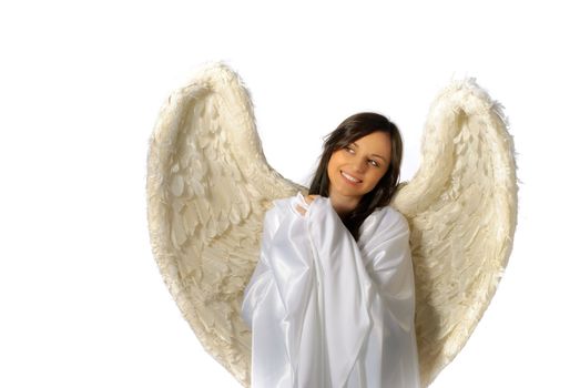 Young woman with angel wings smiling isolated on white