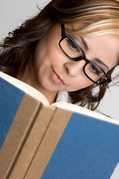 Beautiful woman reading book