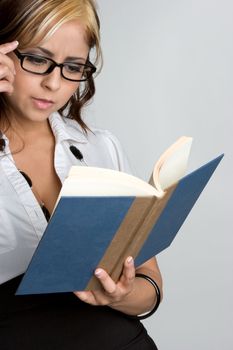 Beautiful woman reading book